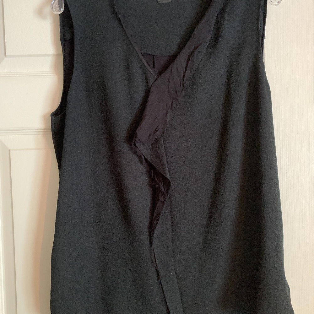 Elie Tahari silk and textured silk black blouse.